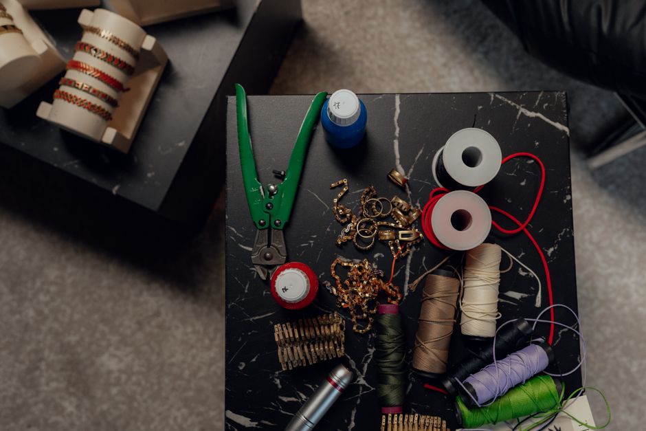 A simple home table with everyday making and craft supplies