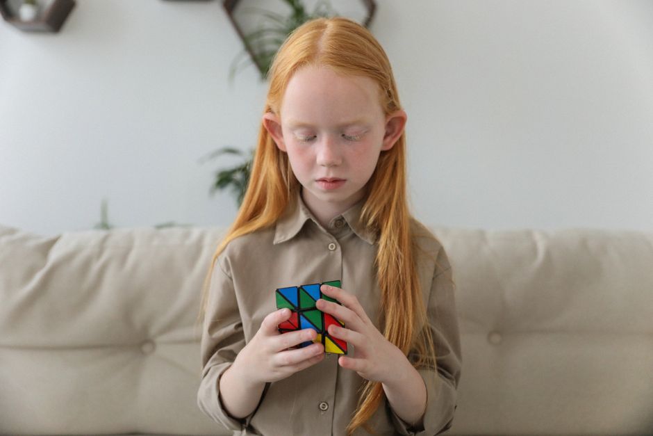 A child working through a difficult, frustrating task